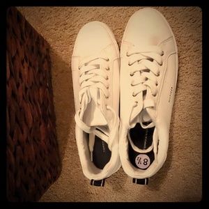Female White tennis shoes
